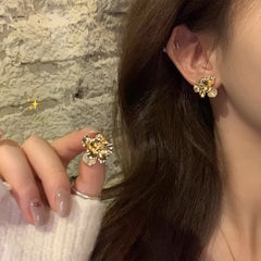 French Retro Metal Cat'S Eye Stone Three-Dimensional Flower Earrings For Women, High-End Niche Design Earrings, Mosquito Coil Disc Ear Clips