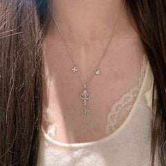 Vintage Iris Flower Key Pendant Necklace – 18K Gold Plated Niche Design Clavicle Chain, Elegant Light Luxury Jewelry for Women