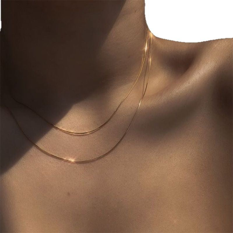 Double-Layer Liquid Gold Snake Bone Necklace – European & American Ins Style Herringbone Chain, Minimalist Niche Design Stacked Clavicle Chain for Women
