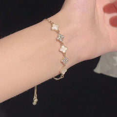 Korean Four-Leaf Clover Shell Bracelet – 18K Gold Plated Lucky Flower Charm, Niche High-End Luxury Hand Jewelry for Women