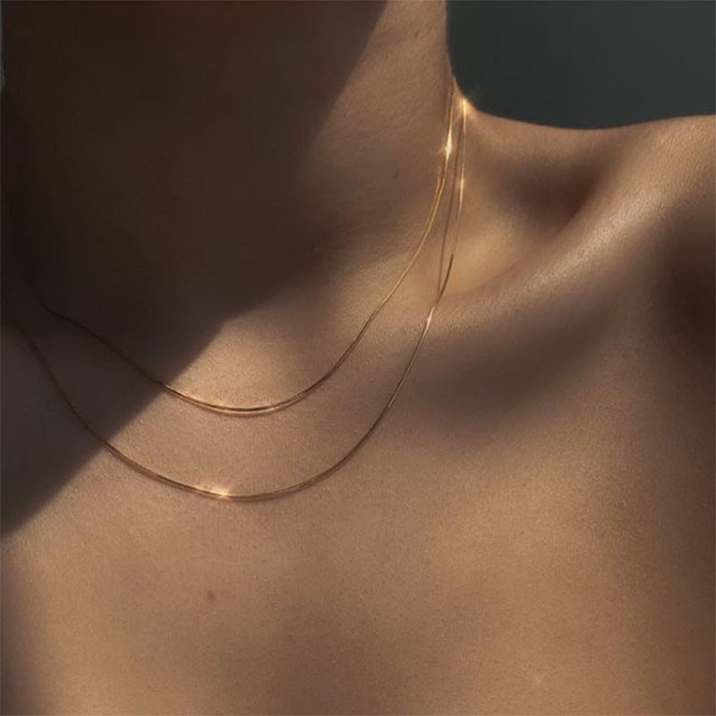 Double-Layer Liquid Gold Snake Bone Necklace – European & American Ins Style Herringbone Chain, Minimalist Niche Design Stacked Clavicle Chain for Women